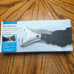Brookstone heated electric windshield scraper with LED light.